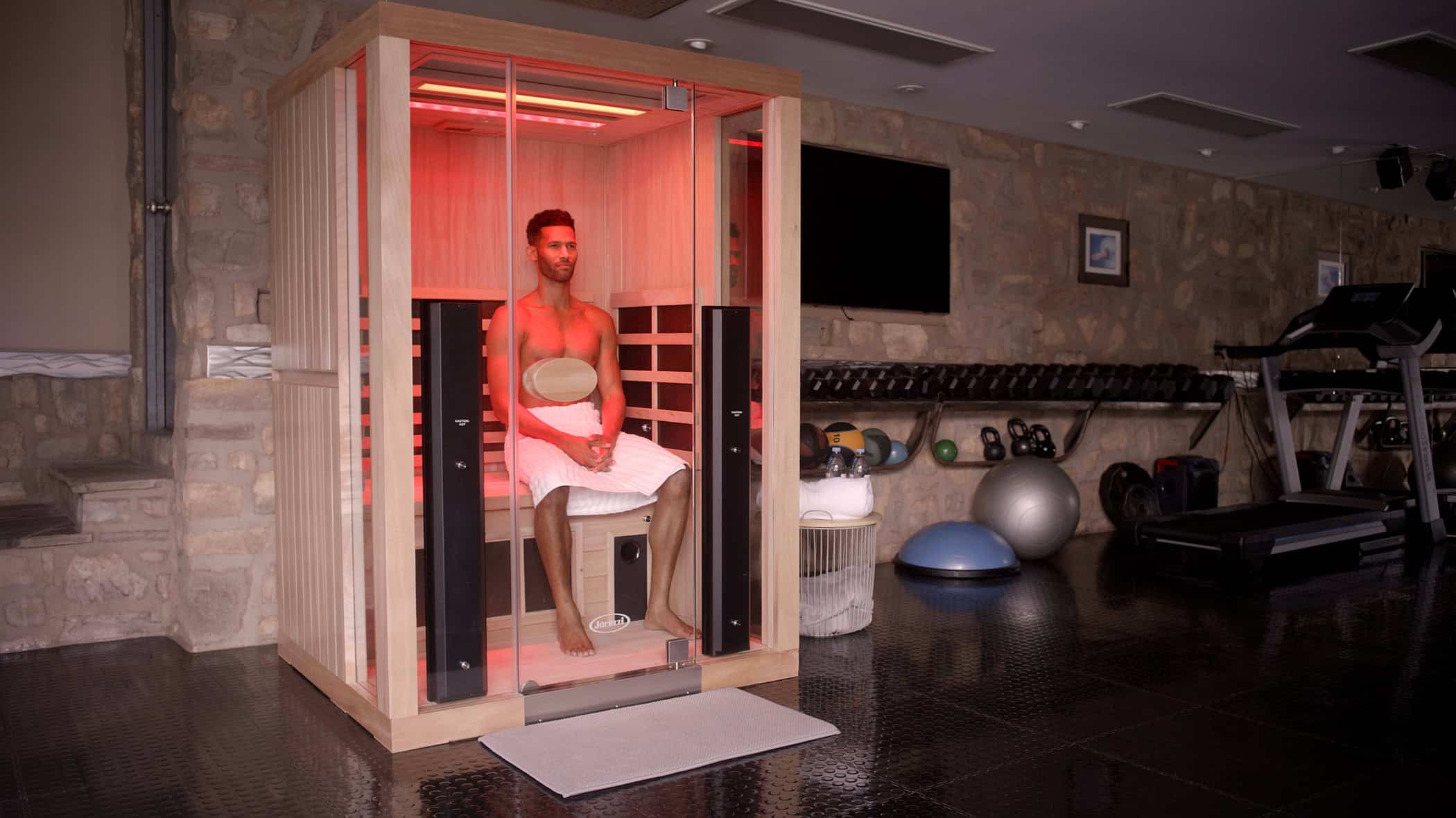 man realxing in jacuzzi sauna